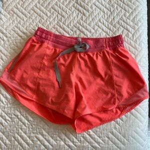 Neon pink Lululemon hotty hot shorts (size 6)